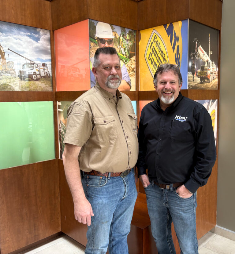 KTSU Regional Sales Manager, Charlie Perry standing with Columbus Equipment Product Support Manager, Matt McConnell during a KTSU America training visit to Columbus Equipment